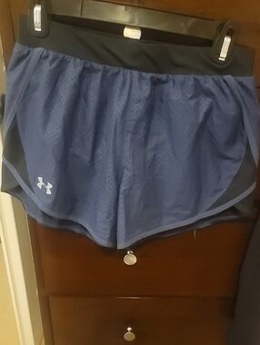 Under Armour Women's Blue Athletic Shorts with Black Waistband And Drawstring